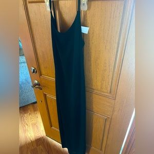 Simple black maxi dress with a little slit in the back
